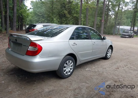 2003 Toyota Camry Le z USA, uszkodzony, nr VIN 4T1BE32K03U197691